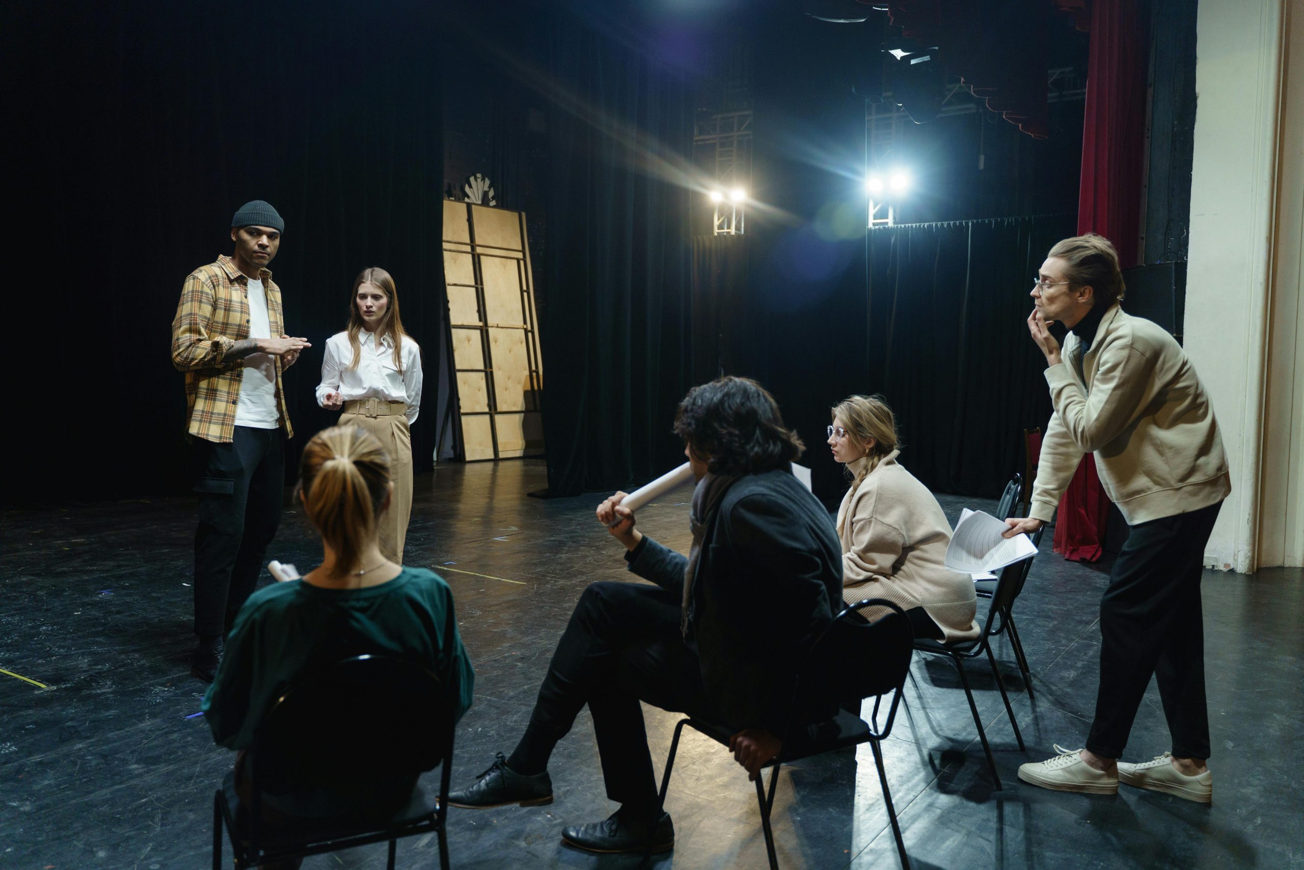 People talking about an upcoming performance